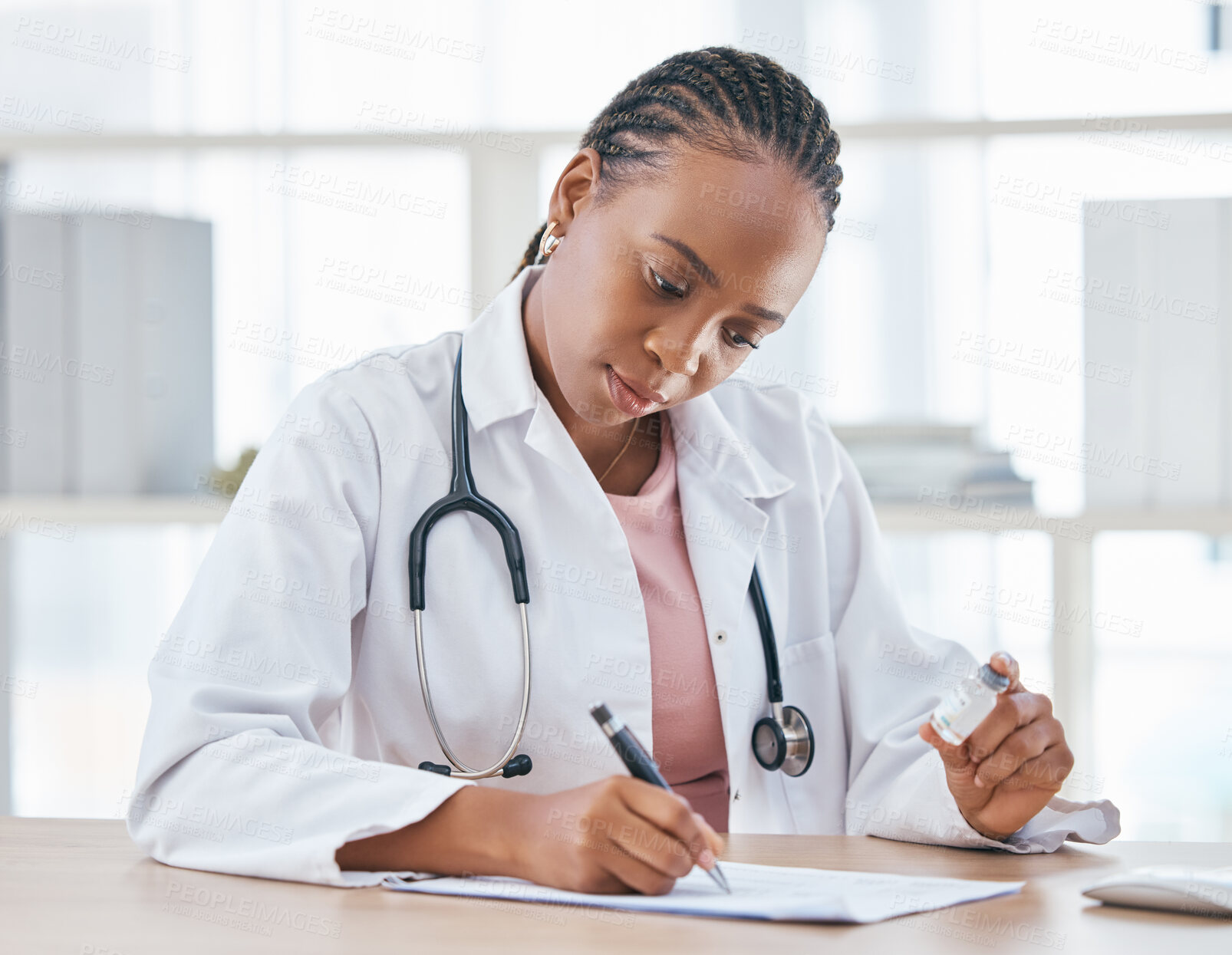 Buy stock photo Medicine, vaccine and doctor writing notes in her office while while preparing a vial for a patient, Healthcare, vaccination syringe and black woman doing inspection on a medical product in hospital.