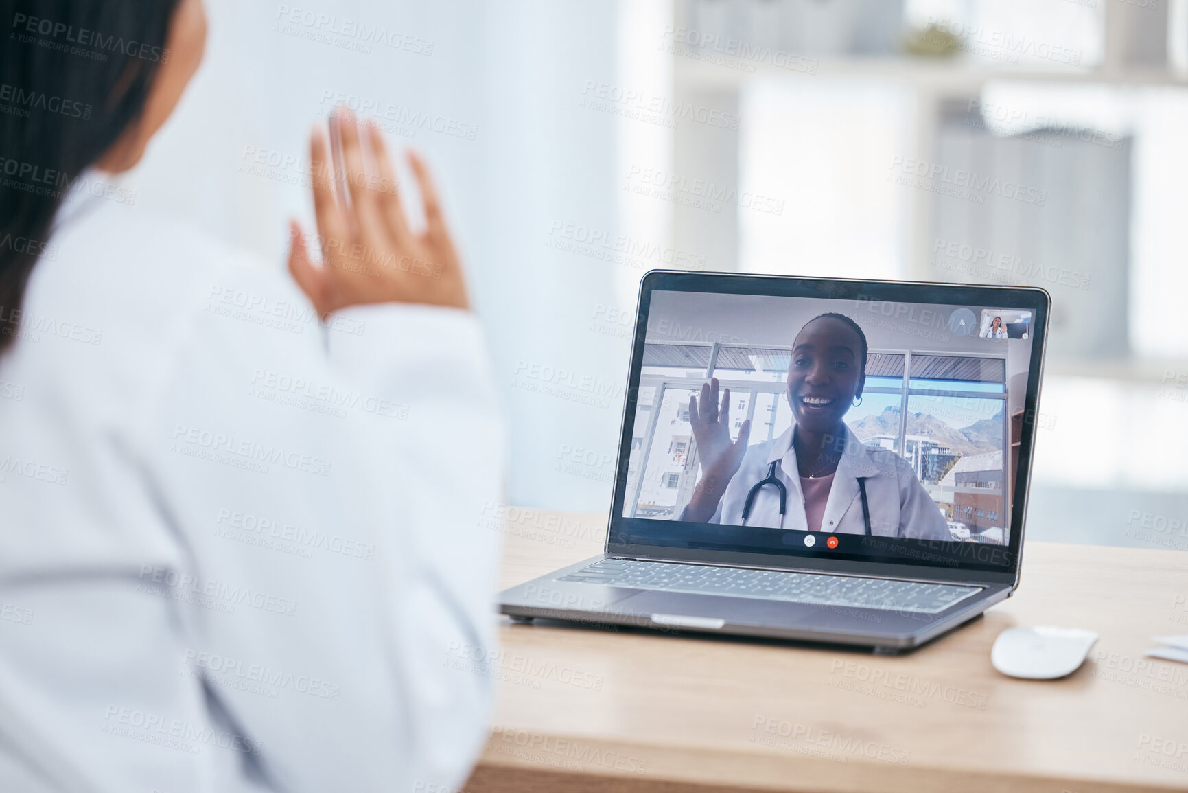 Buy stock photo Doctor, video call and wave with a health professional consulting with a colleague on a laptop screen. Healthcare, insurance and advice with a female medicine worker and coworker in a virtual meeting