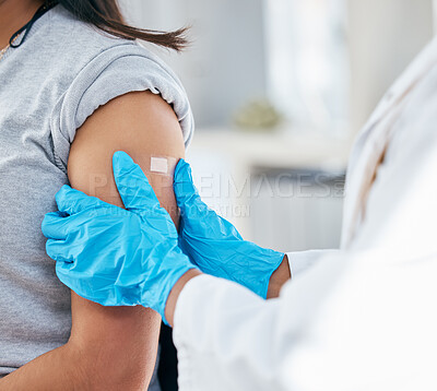 Buy stock photo Doctor, vaccine and patient arm, plaster and medical healthcare for flu shot, hpv and covid 19 risk in clinic hospital. Corona virus consulting, wellness service and bandage treatment for immunity 