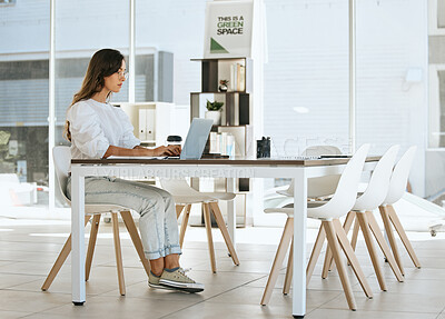Buy stock photo Office, laptop and business woman at desk working online, using internet and doing marketing research. Technology, web design and girl at desk in modern office typing, writing and work on computer