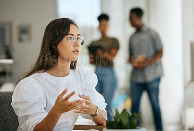 Buy stock photo Business woman, creative office and thinking at desk while talking and explaining plan, idea or strategy in a coworking workplace. Designer planning creativity, project and innovation or vision