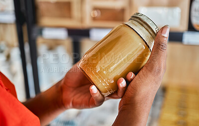 Buy stock photo Shopping, peanut butter in hands and grocery store customer decision for sale product, discount or market promotion. Supermarket, groceries and food in glass jar for eco friendly and vegan choice