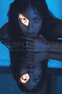 Buy stock photo Mirror reflection woman, art portrait and dark creative fashion, fantasy and light eye closeup. Model reflect, mystery face or makeup in beauty intensity with sensual, sexy or shadow eyes in blending