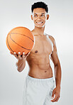Sports, basketball and man in a fitness studio after training, workout or exercise with a smile on his face. White background, wellness and happy fitness model or basketball player with mockup space