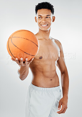 Buy stock photo Sports, basketball and man in a fitness studio after training, workout or exercise with a smile on his face. White background, wellness and happy fitness model or basketball player with mockup space