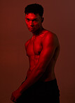 Black man, body and dark light on red background in studio for exercise, training or workout bodybuilder, personal trainer or coach. Portrait, fitness model or red light aesthetic for health wellness