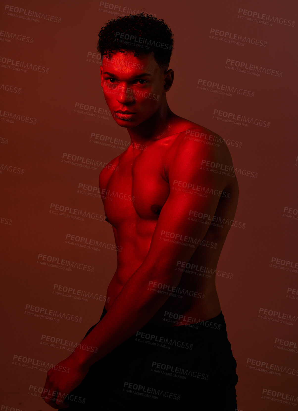 Buy stock photo Black man, body and dark light on red background in studio for exercise, training or workout bodybuilder, personal trainer or coach. Portrait, fitness model or red light aesthetic for health wellness