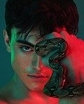 Skincare, neon light and snake for skincare, danger and venom or poison for dermatology, power or aesthetic background. Portrait of model male in studio with python animal for beauty, art and fashion