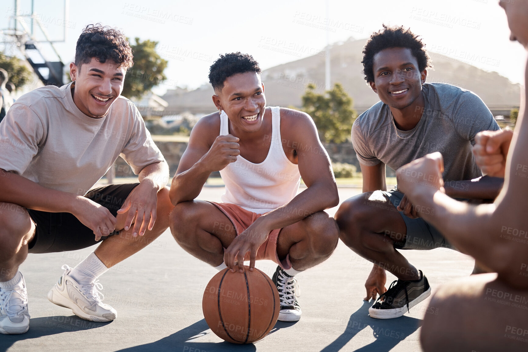 Buy stock photo Basketball player, team and group talking for motivation and game strategy planning together with training coach in outdoor sun. Diversity basketball friends talking or listening to motivate speech
