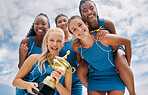Women sports trophy, team portrait below and girl happiness smile for winning sport competition. Woman together happy, winner collaboration success and netball teamwork celebration for winning group