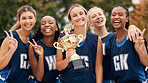 Netball, trophy and winner women team portrait with success, goal and celebration for competition or outdoor game. Happy sports teenager group with motivation, prize and celebrate winning achievement