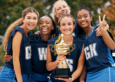 Buy stock photo Women, team and winner trophy in fitness game, training match or exercise competition on netball sports field. Portrait, happy smile or sports award for teamwork diversity or friends workout success 
