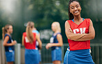 Portrait, netball and black woman on sports court ready for game, competition or match. Health, fitness and happy players outdoors preparing for training, exercise or fitness workout on field outside