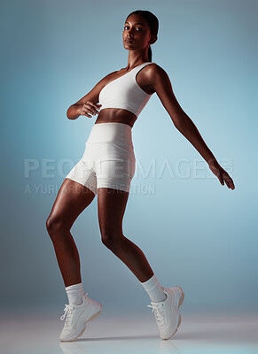 Buy stock photo Fitness, dancing and body of black woman balance in studio mock up for energy, workout training or wellness marketing portrait. Sports, athlete and dancer model exercise clothes, sneakers or fashion