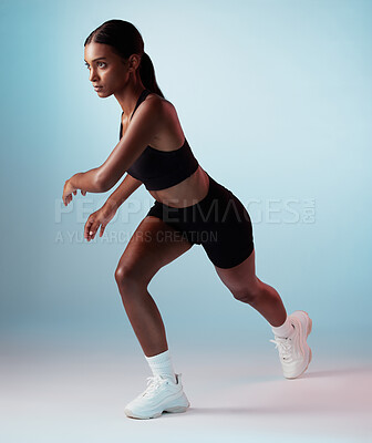 Buy stock photo Fitness, body and workout woman in a studio mock up for fashion advertising or marketing. Young Indian girl sports runner with health training, wellness and exercise lifestyle on gradient blue mockup