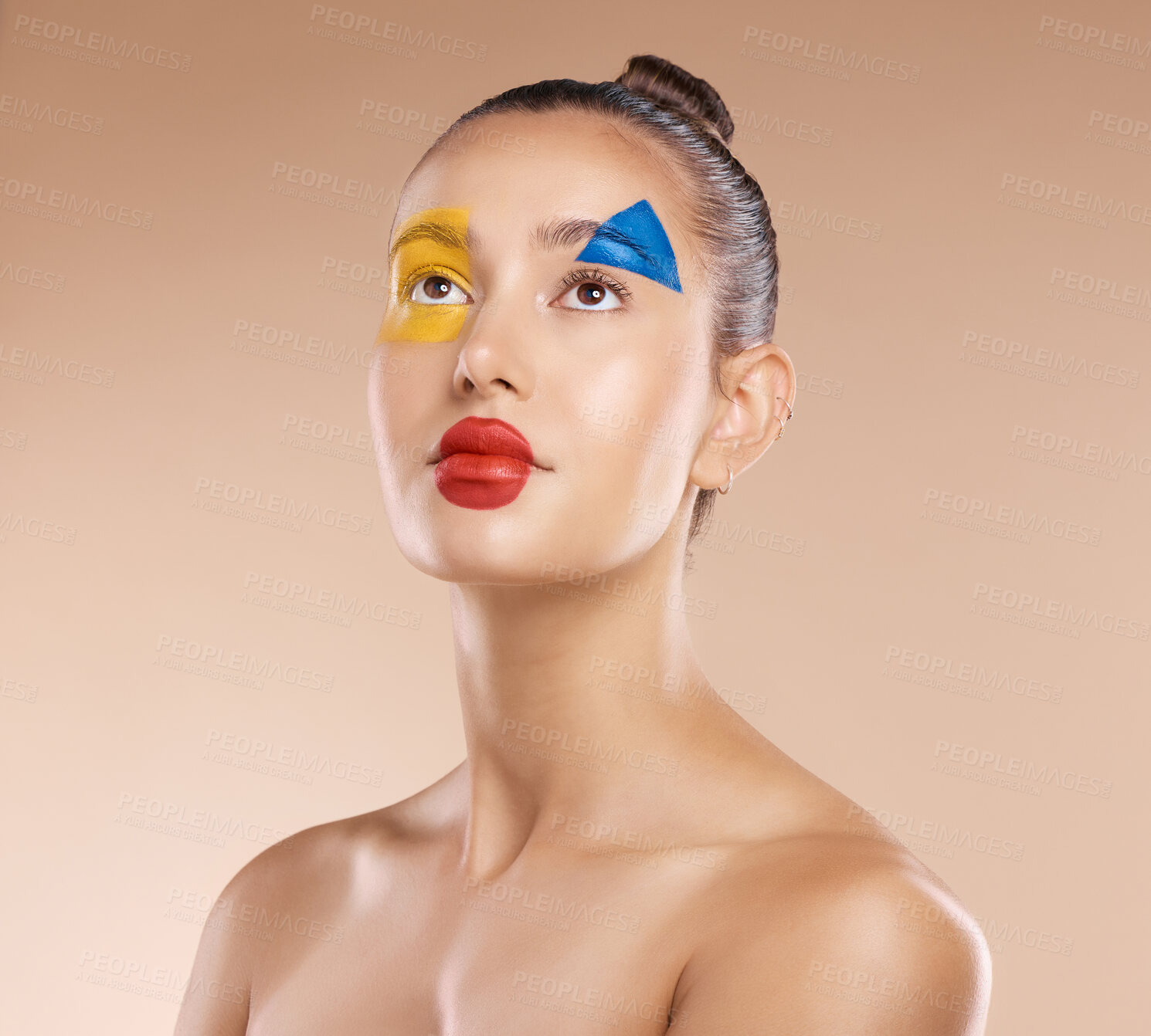 Buy stock photo Makeup, clown and young woman with facial art, natural beauty and wellness with brown studio background. Artist, female and girl being creative, with pride and confident with cosmetics or face paint.