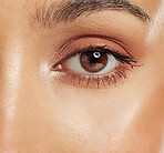 Beauty, mascara and closeup of an eye with cosmetics, natural makeup and neutral eyeshadow. Vision, lashes and macro zoom of a  woman with a brown iris with face or skin cosmetic products.