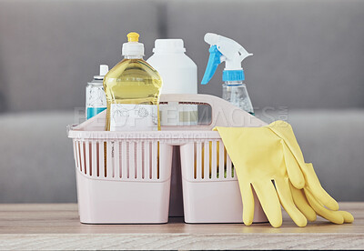 Buy stock photo Cleaning container, spray bottle or rubber gloves on table in house, home or hotel living room for bacteria protection cleaner service. Zoom, housekeeping or healthcare hygiene product in maintenance