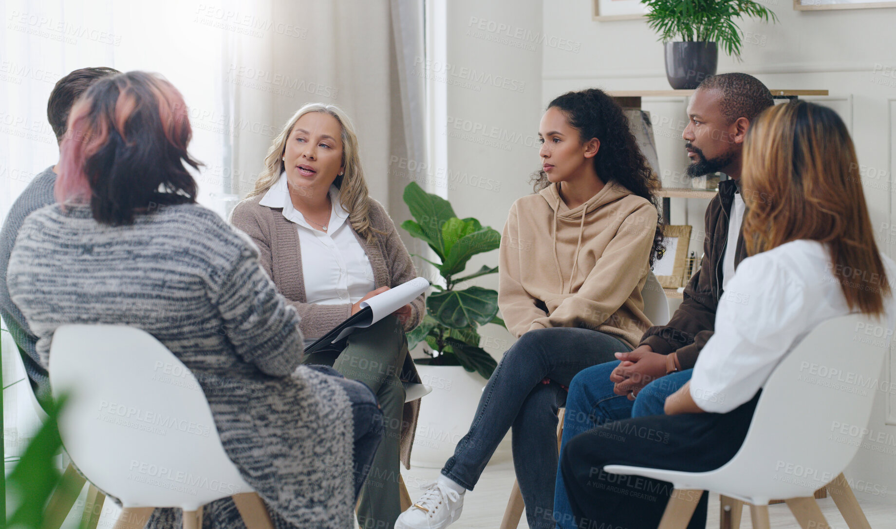 Buy stock photo Counseling, group and psychology discussion with group of diversity people in therapy for depression, stress and anxiety. Men and women healing during psychologist meeting talking about mental health