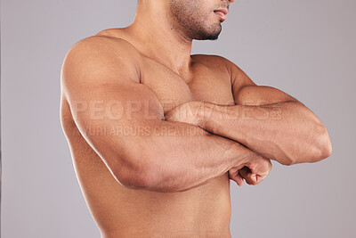 Buy stock photo Strong, flex and man arms with muscle after training while standing in a studio with gray background. Power, motivation and closeup of athlete model with strength from bicep after workout or exercise