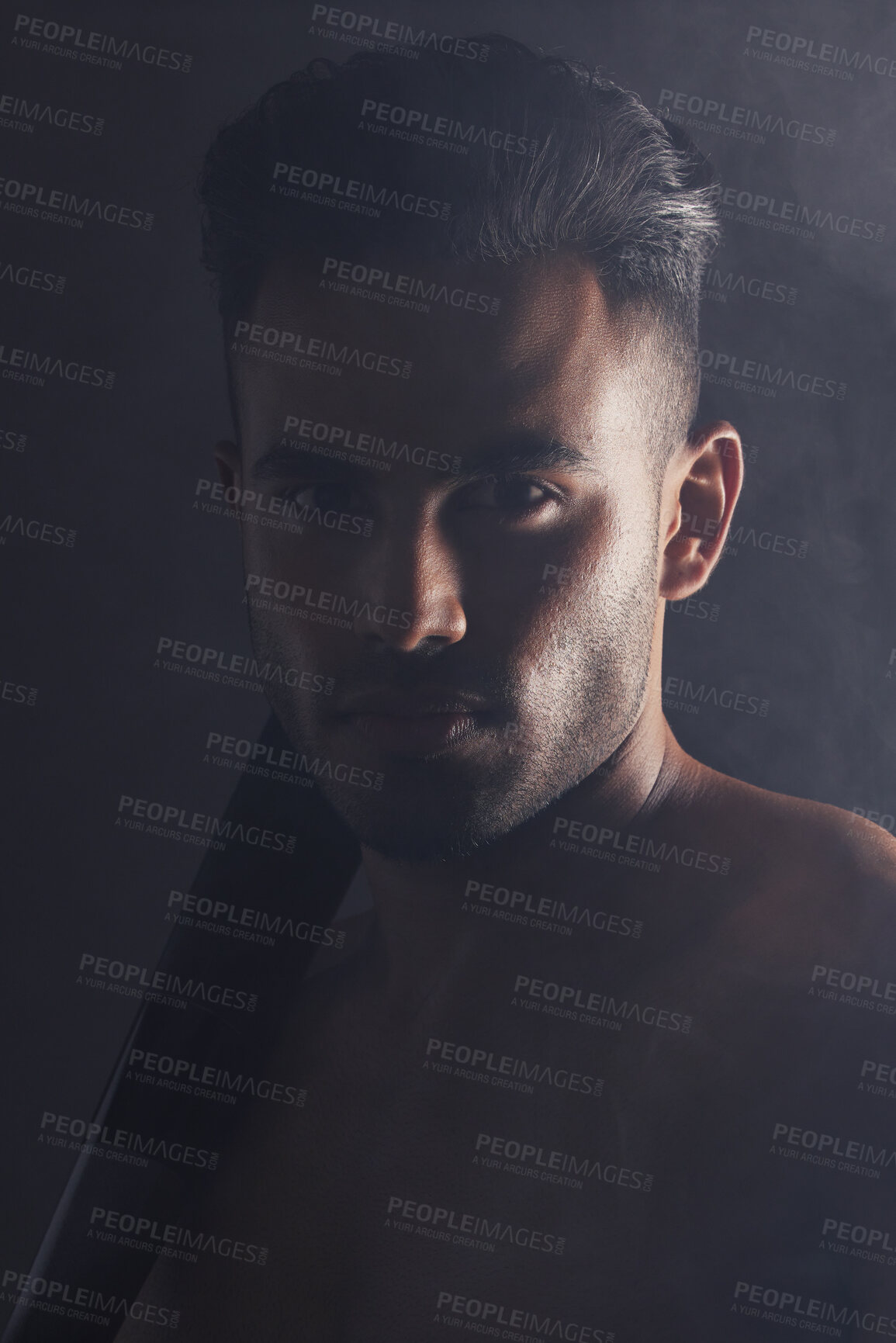 Buy stock photo Fitness, baseball bat and portrait of man in studio background in dark creative art shoot in India. Beauty, danger and professional male model, topless Indian man and serious face on black background