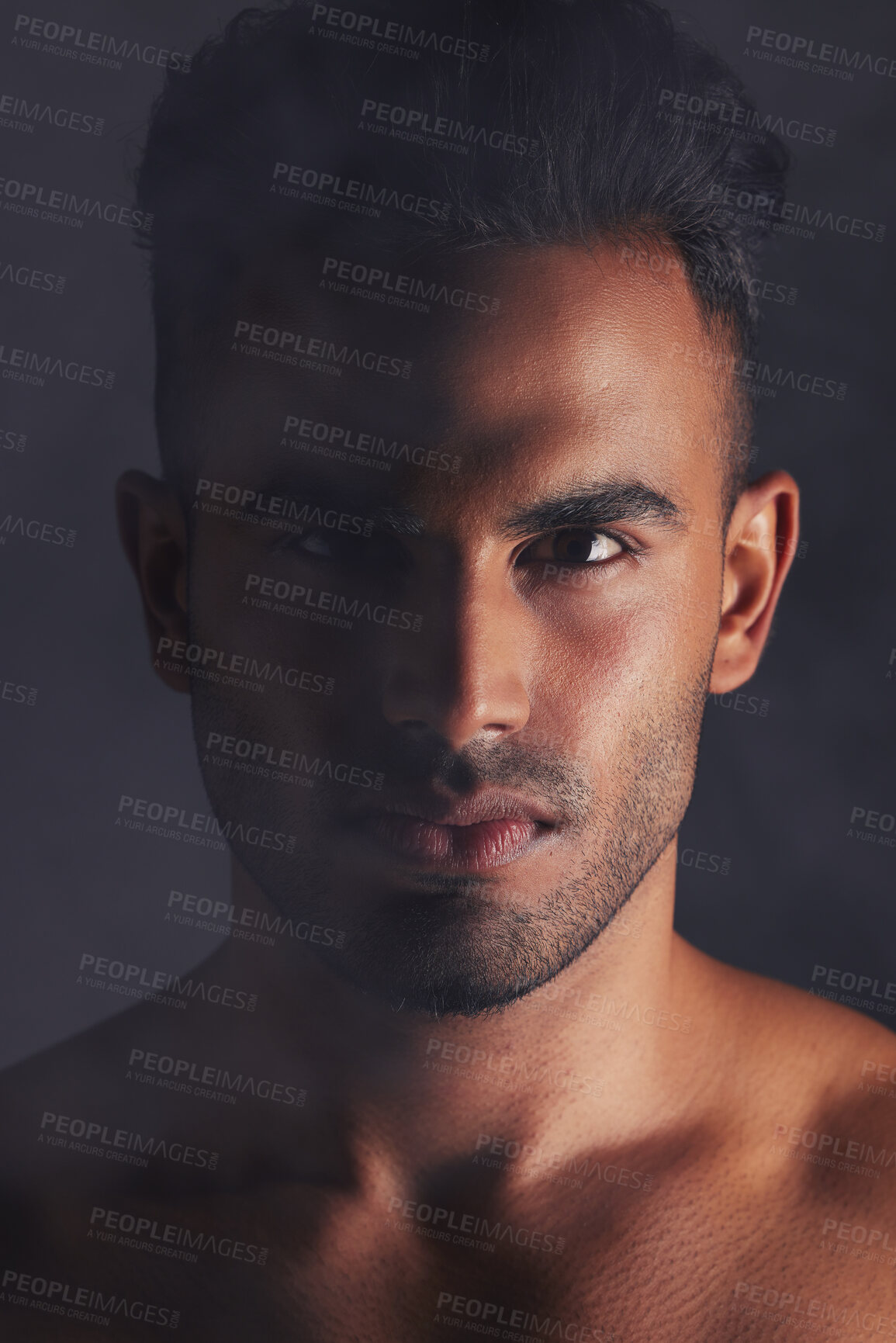 Buy stock photo Studio, beauty and sexy portrait of man from India, serious face and topless with dark art black background. Fitness, wellness and skincare for health or body care, sensual Indian model and sexy man.