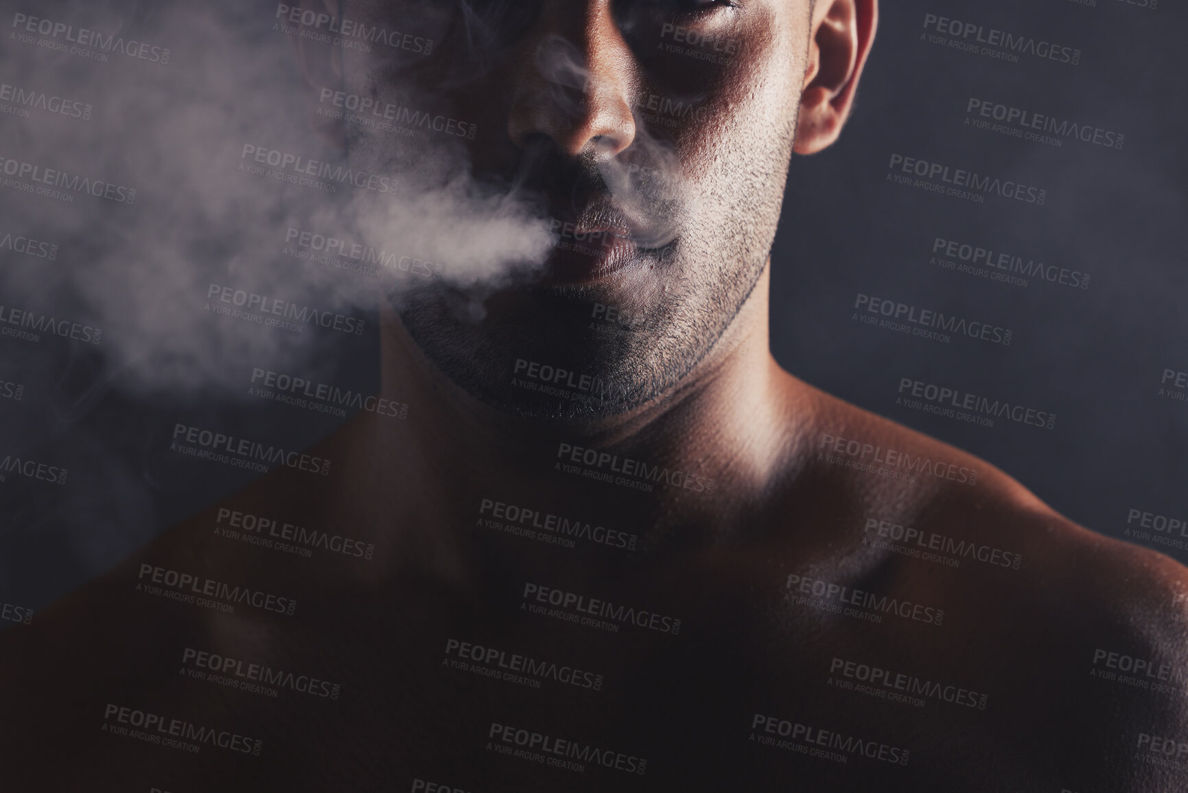 Buy stock photo Smoke cloud, face and man in studio for addiction, smoker  and bad habit on black studio background mockup. Tobacco, vape or marijuana with guy model pose with space for awareness, cancer and health