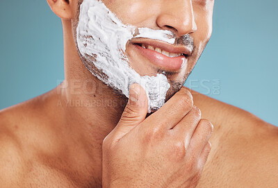 Buy stock photo Shaving cream, cleaning and foam with man for beauty, health and wellness mockup on blue studio background. Male happy about skincare facial for clean and healthy skin with hair removal and self care