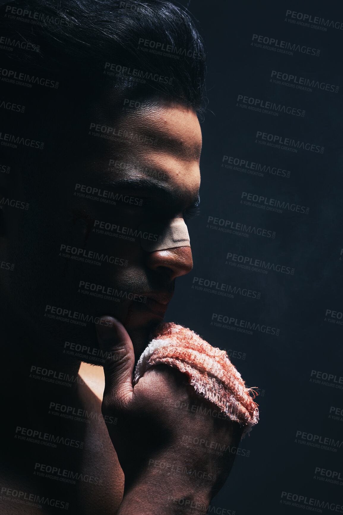 Buy stock photo Boxing, blood and fight man in dark studio mock up for workout, fitness and training risk, danger and first aid sports marketing. Boxer, sports or power person with fist and nose injury for violence