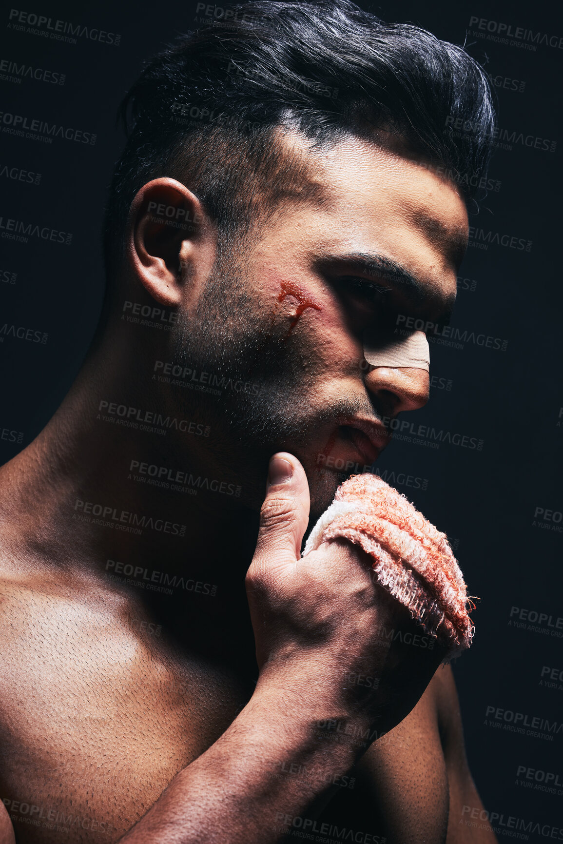 Buy stock photo Injury, blood and man with a bandage from fighting or training for MMA or kickboxing in a dark studio. Violence, hurt and  guy boxer from Mexico after sports competition isolated by black background.