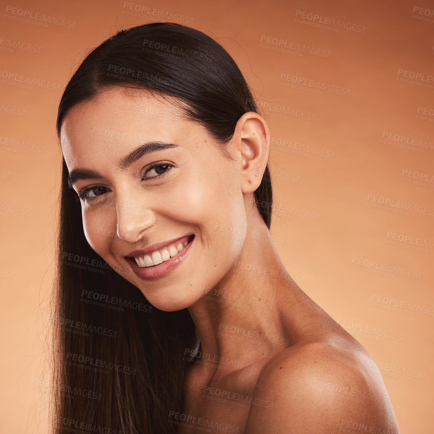 Buy stock photo Hair care, beauty and portrait of a woman with a smile for makeup, skincare and wellness against a brown mockup studio background. Happy, luxury and girl model with beautiful hair and mock up space