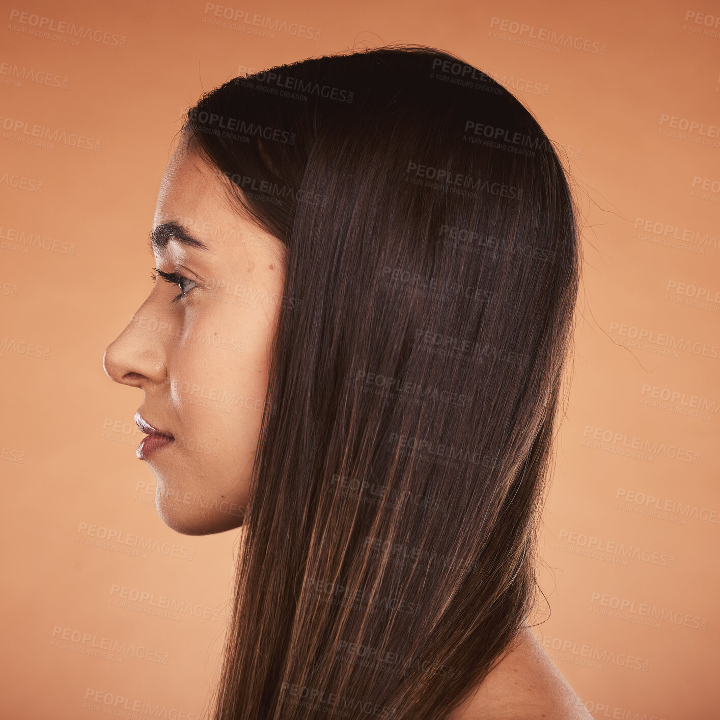 Buy stock photo Hair, beauty and woman face for healthy hairstyle and hair care on a brown studio background. Hair style, haircare and cosmetic treatment for shiny, healthy hair in a salon with a headshot profile