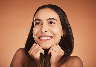 Buy stock photo Skincare, hair care and young woman with natural beauty, confident smile and cosmetics with brown studio background. Portrait, makeup and healthy girl with organic facial, wellness and smooth skin.
