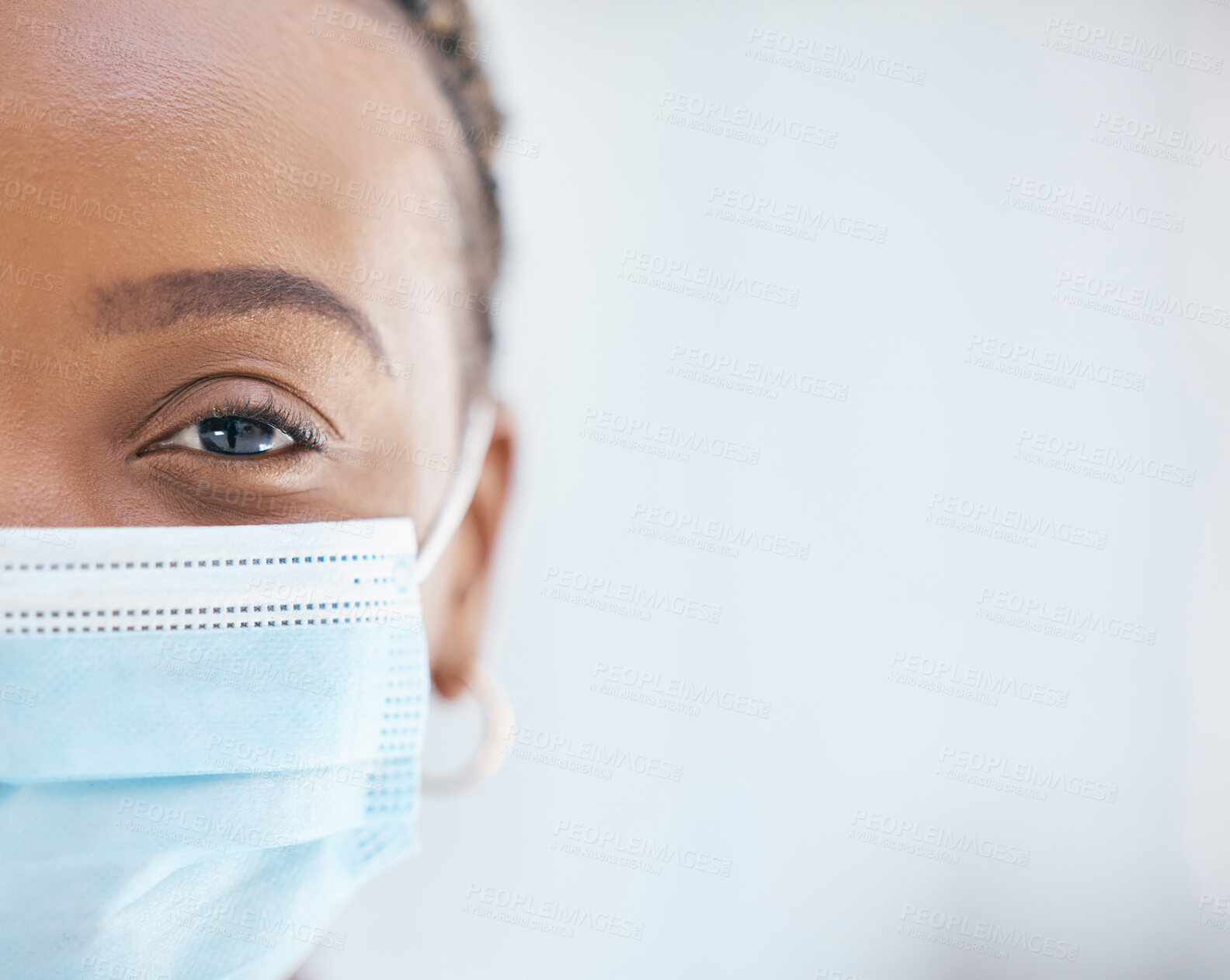 Buy stock photo Covid, face mask and portrait of doctor working in hospital with safety, compliance and vision in eye for health, healing and innovation. Black woman in healthcare and medical field during covid 19