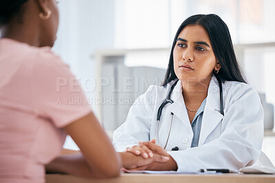 Buy stock photo Support, diagnosis and doctor doing a consultation with a patient in medical clinic or hospital. Test results, bad news and healthcare worker consoling and holding hands with black woman in office.