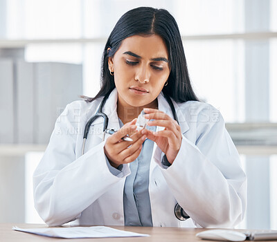 Buy stock photo Woman with medication prescription, health and doctor in hospital office, focus and reading instruction label. Healthcare, stethoscope and medical paperwork on desk, vaccine or cold and flu medicine.