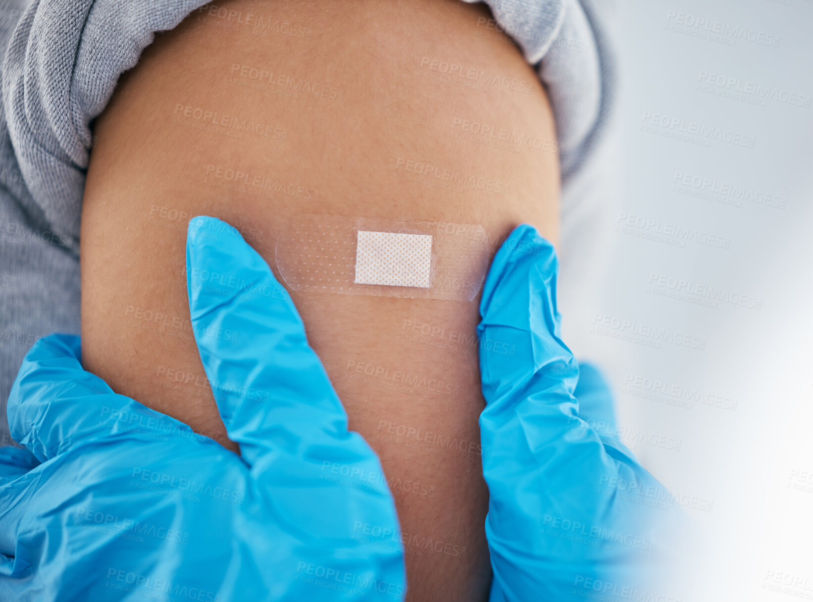 Buy stock photo Hands, plaster and arm in covid vaccine for injection, cure or  jab at doctor appointment by the hospital. Hand of healthcare GP applying bandage to patient for vaccination, immunization or booster