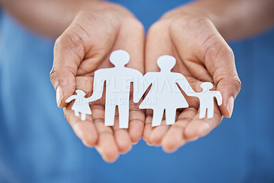 Buy stock photo Hands, paper and advertising for family insurance, support and trust with charity, values or community. Woman hand for marketing kindness, family cutout of people with planning life for future