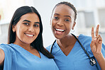 Nurses, medical students and women taking selfie for social media, collaboration or healthcare commitment in hospital. Happy, portrait and diversity clinic doctors on internship taking photo together