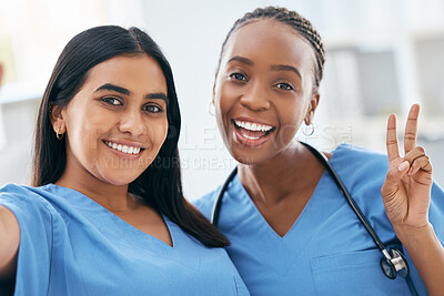 Buy stock photo Nurses, medical students and women taking selfie for social media, collaboration or healthcare commitment in hospital. Happy, portrait and diversity clinic doctors on internship taking photo together