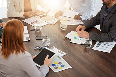 Buy stock photo Finance, portfolio and business people in meeting planning a financial strategy for revenue, profit and sales growth. Paperwork, teamwork and startup company employees coworking on report documents