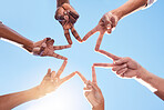 Star, hands and team, solidarity and peace with diversity and community collaboration with blue sky and sun. Team building, together and group with support and trust, hand gesture and sign outdoor.