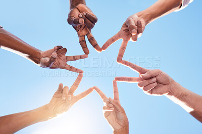 Buy stock photo Star, hands and team, solidarity and peace with diversity and community collaboration with blue sky and sun. Team building, together and group with support and trust, hand gesture and sign outdoor.