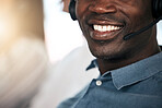 Customer support, black man and smile of a telemarketing worker on a call. Happy internet call center employee working on customer service, digital consultant work and contact us communication
