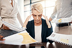Business woman, stress, burnout and documents with staff question, management and frustrated with work load. Mature manager with mental health, tired and headache while working with finance paperwork