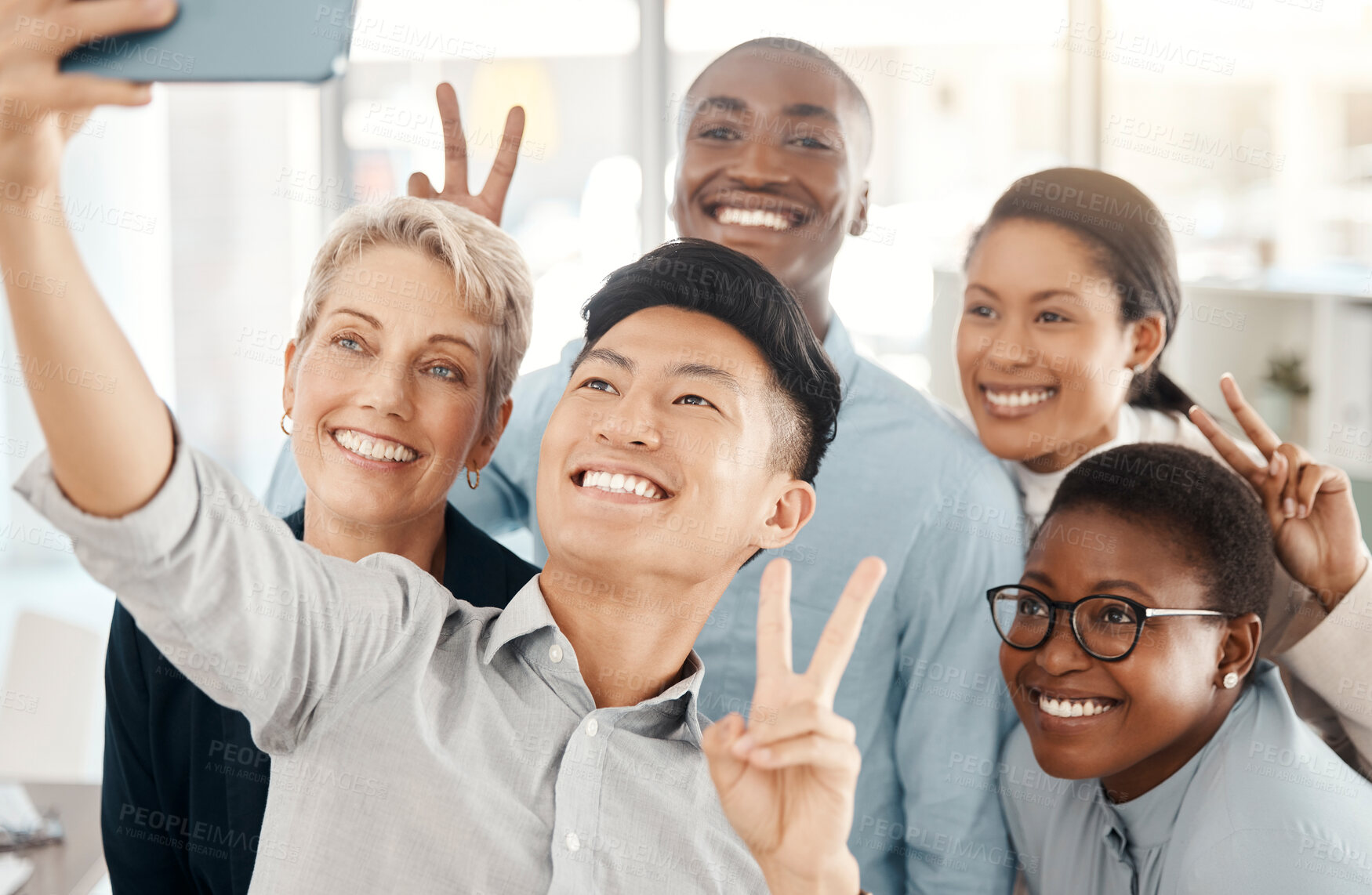 Buy stock photo Team selfie, support and diversity with business people in office, community in workplace and teamwork picture. Partnership, solidarity and working together, happiness and peace gesture at company.