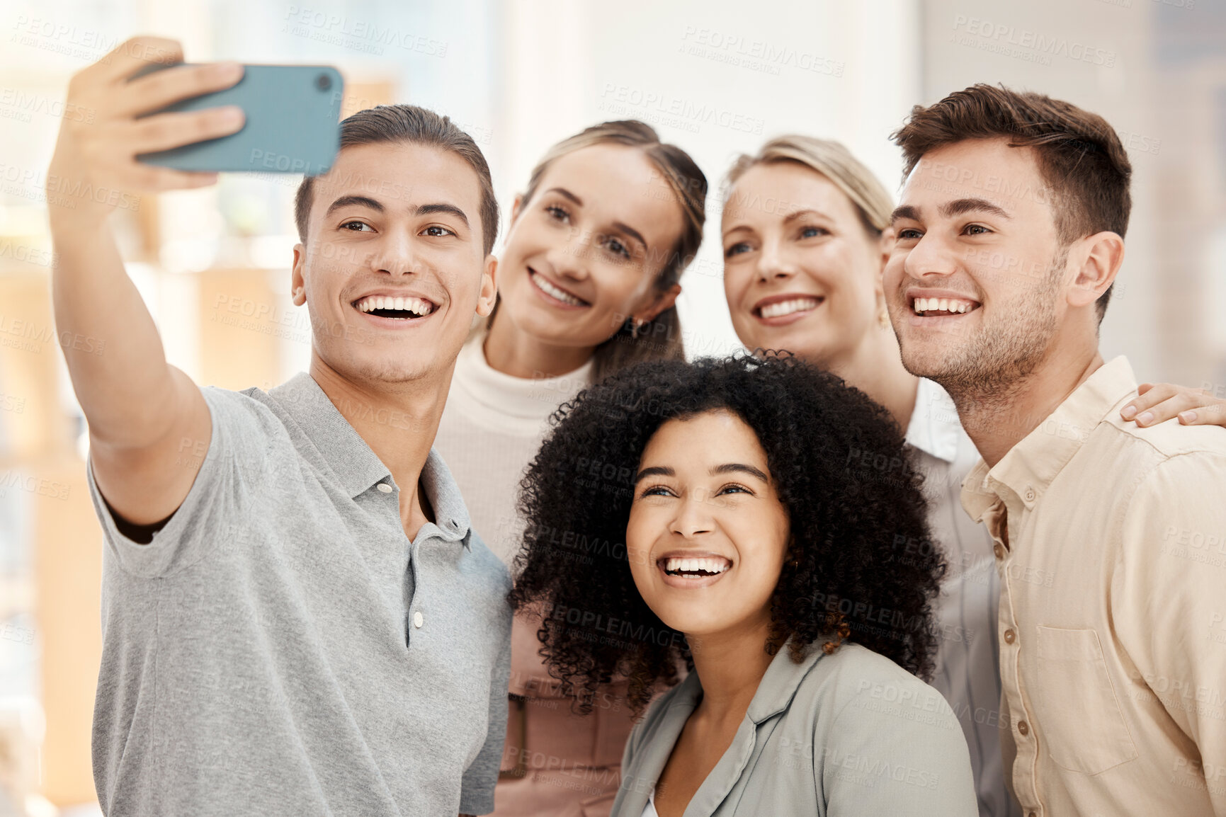 Buy stock photo Diversity work, happy group selfie with phone in office for solidarity or team building in marketing startup. Multicultural team smile, smartphone photo together or workplace happiness community