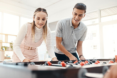 Buy stock photo Office team, table soccer and team building while playing foosball game together for competition at work. Happy man and woman employees having fun in a casual and positive workplace for motivation