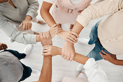 Buy stock photo Top view, business people or holding wrist in support, growth power or marketing community, team building or office trust. Creative teamwork, collaboration success or men with women diversity circle