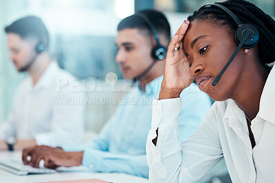 Buy stock photo Headache, call center and burnout with a black woman in telemarketing looking tired or exhausted. Consulting, compliance and customer service with mental health issues of a female crm representative